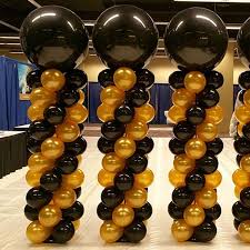 Black & gold balloon columns